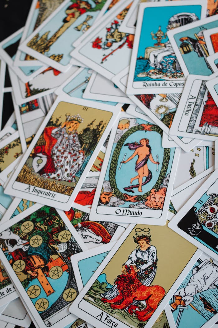 A vibrant spread of various tarot cards displaying mystical imagery.